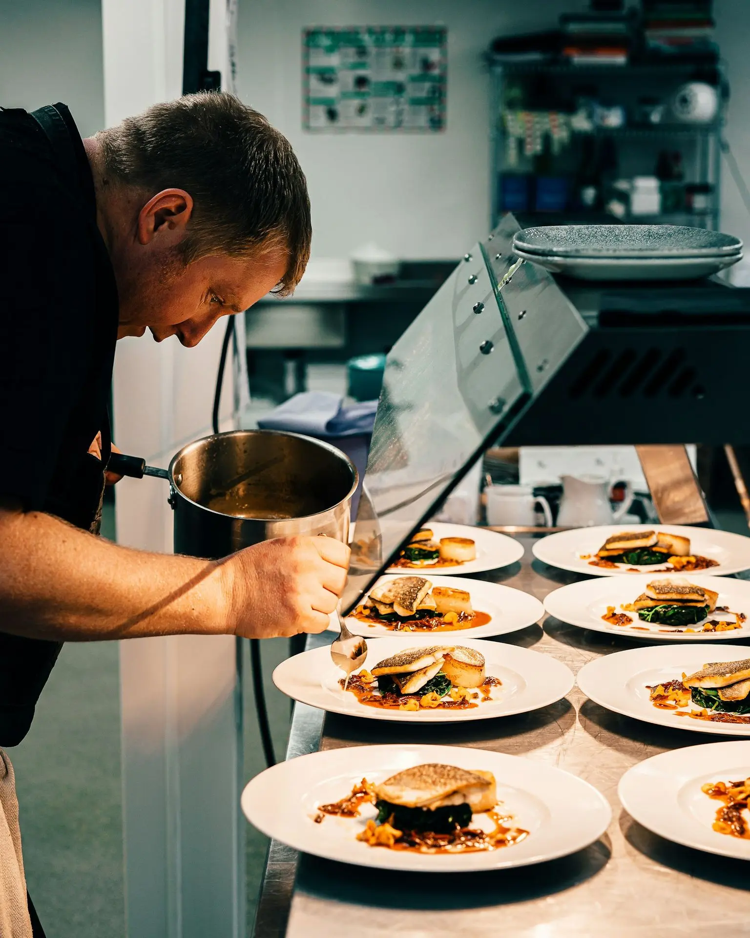 Chef plating a dish